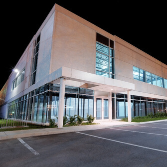 A commercial building exterior, representing environments that require Pest Control for Commercial Buildings to maintain safety and hygiene.